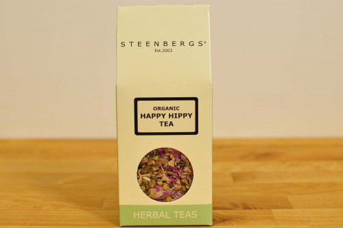 Steenbergs Organic Happy Hippy Loose Leaf Herbal Tea, a floral mix of chamomile, rose with mint, caffeine free, from the Steenbergs UK online shop for organic loose leaf herbal teas.
