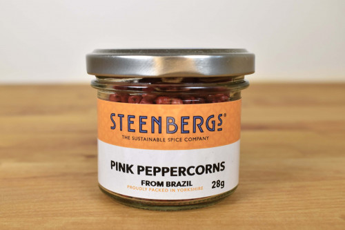 Steenbergs Pink Peppercorns in glass jar from the Steenbergs UK online spice shop.
