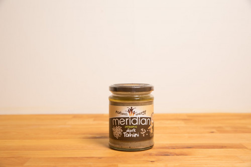 Old style Meridian Organic Dark Tahini Paste from the Steenbergs UK online shop for organic food and cooking ingredients.