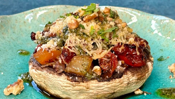 Baked Portobello Mushroom stuffed with roasted vegetables and pesto
