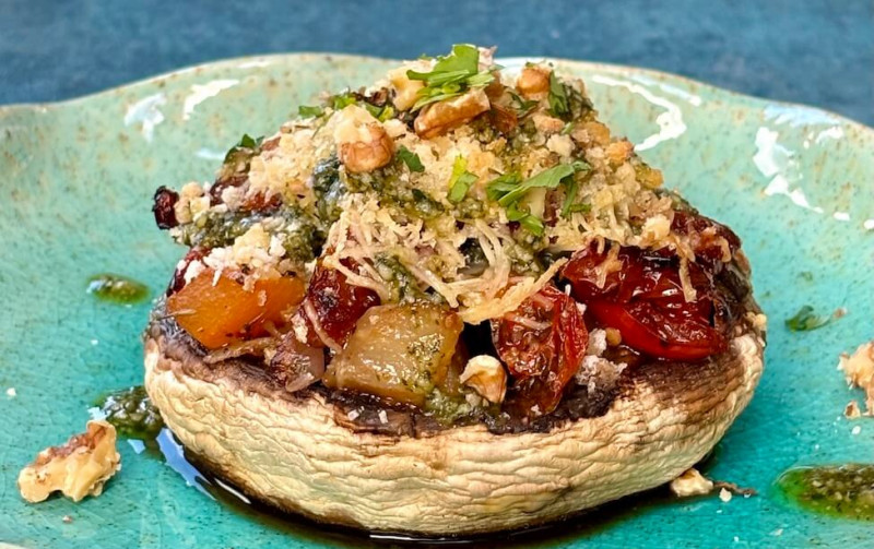 Baked Portobello Mushroom stuffed with roasted vegetables and pesto